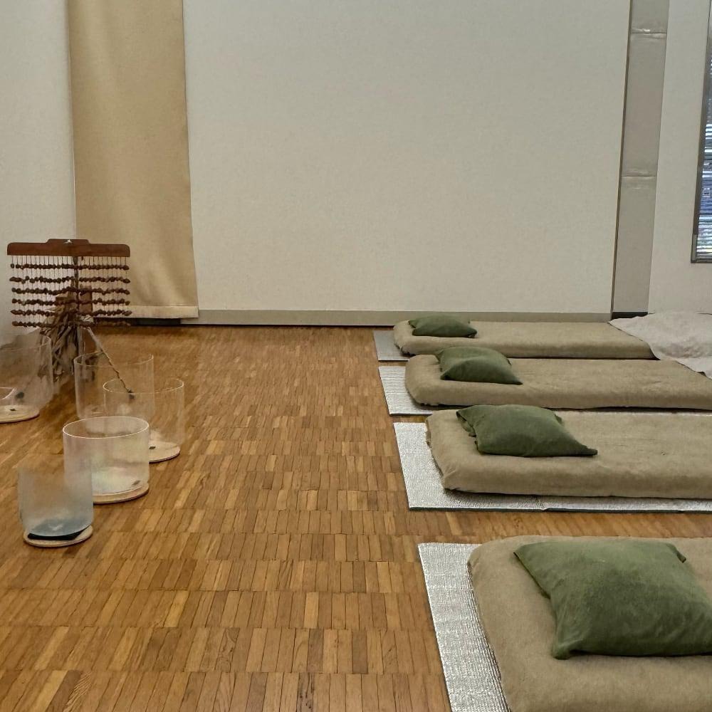 Mats, cushions and musical instruments inside studio PLAYA in Tokyo